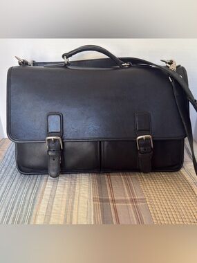 Classic Coach Organizer Brief in black with silver hardware.